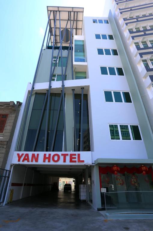 a view of a van hotel building at Yan Hotel in George Town
