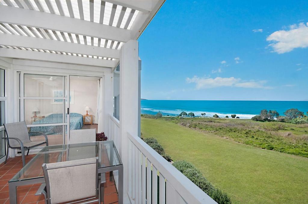 a balcony with a view of the ocean at Quarterdeck 20 in Lennox Head