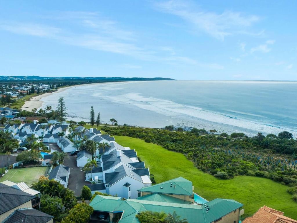 an aerial view of the beach and houses at Quarterdeck 18 in Lennox Head