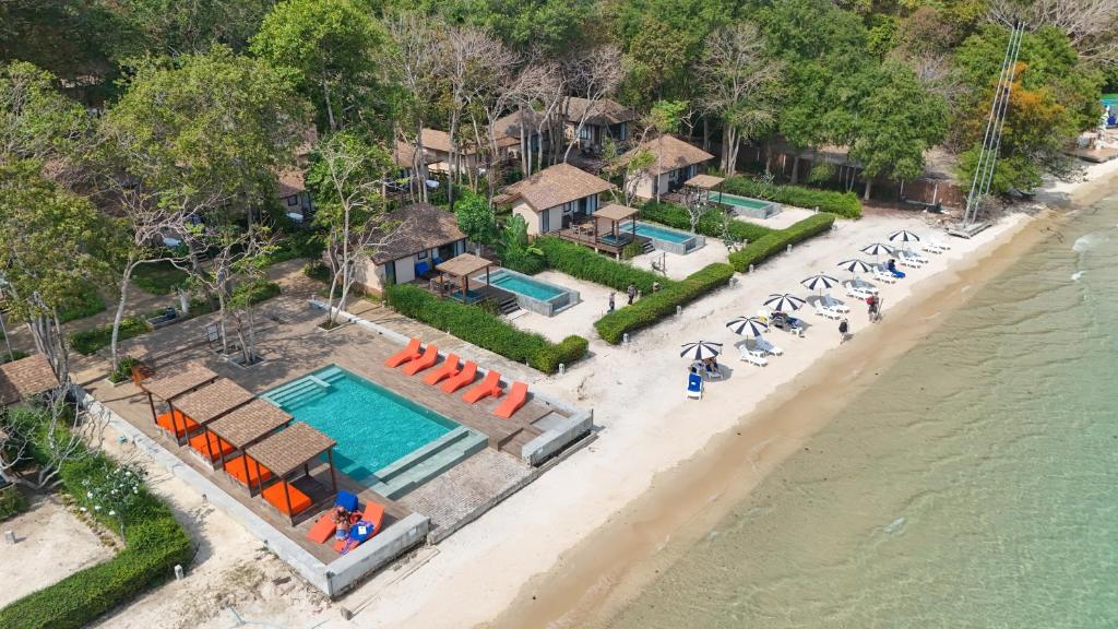 an aerial view of a beach with a swimming pool at Samed Amoris Resort & Pool Villas in Ko Samed