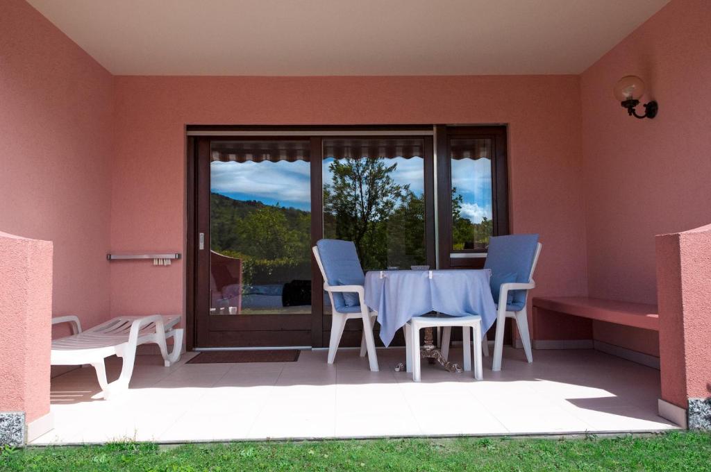 Fotografie z fotogalerie ubytování Hotel Garni Villa del Sole v destinaci Ponte Tresa