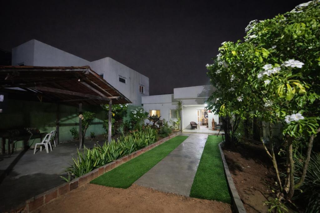 a courtyard of a house at night at Casa do carnaval - Olinda in Olinda