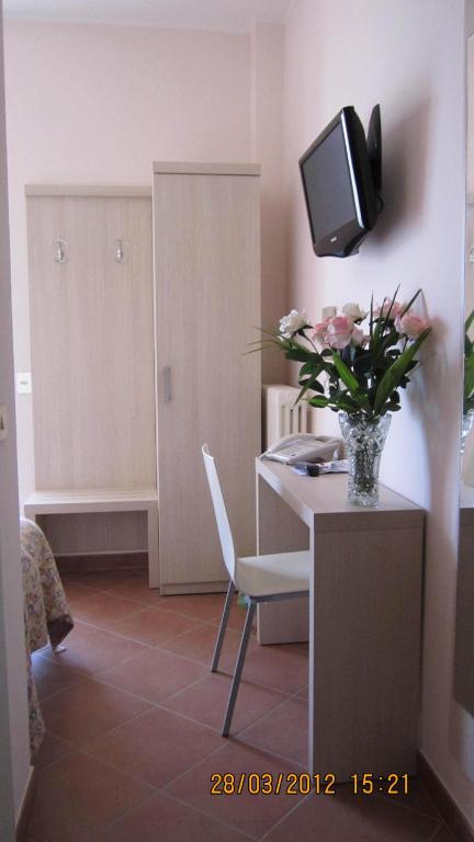 TV a/nebo společenská místnost v ubytování Albergo Riva