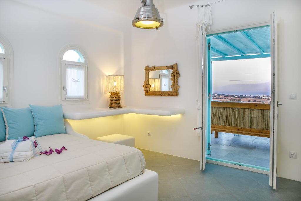 Posteľ alebo postele v izbe v ubytovaní Aegean Queen Villas