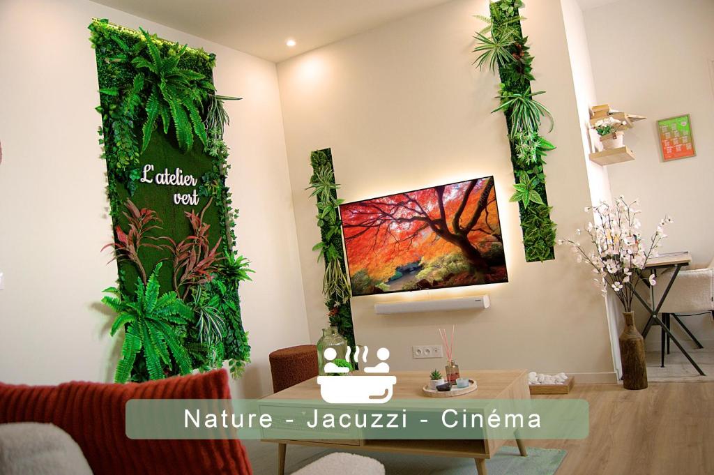 a room with three palm trees on the wall at L'atelier vert - SPA, Suite Luxe, Proche Hypercentre - Classé 4 étoiles in Troyes