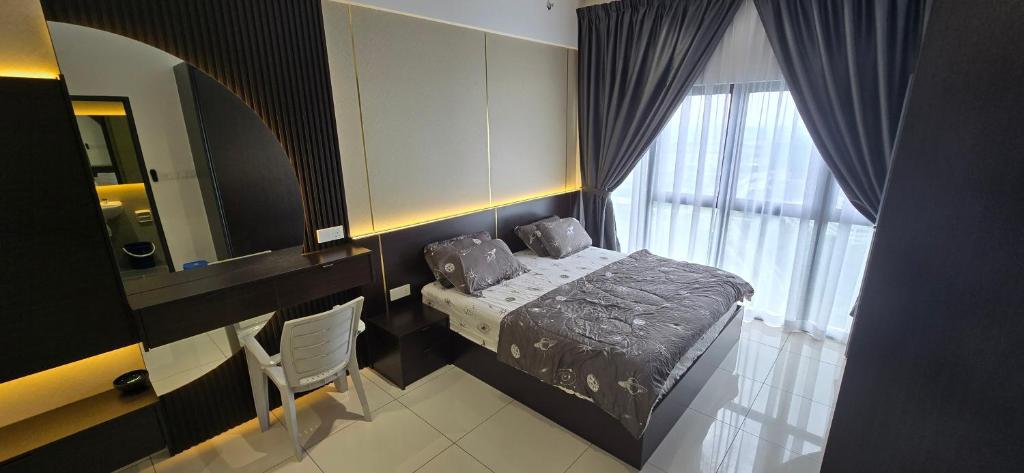a bedroom with a bed and a mirror and a window at Setia Alam Homestay - Quiet High-Floor Studio in Shah Alam