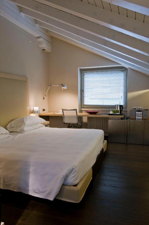 Posteľ alebo postele v izbe v ubytovaní Active Hotel