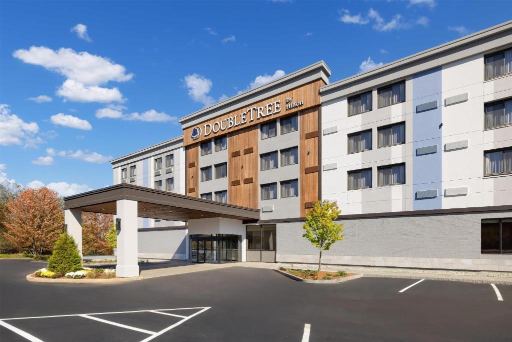 a rendering of the front of a building at Doubletree By Hilton Concord Downtown in Concord