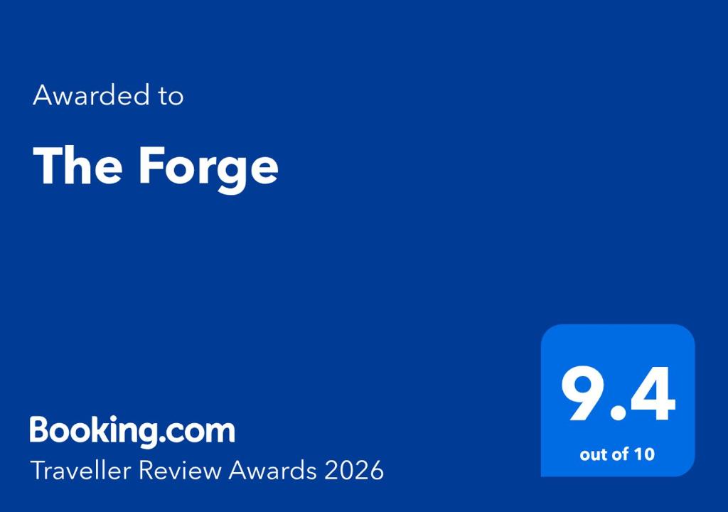 a blue screen with the text awarded to at The Forge in Towcester