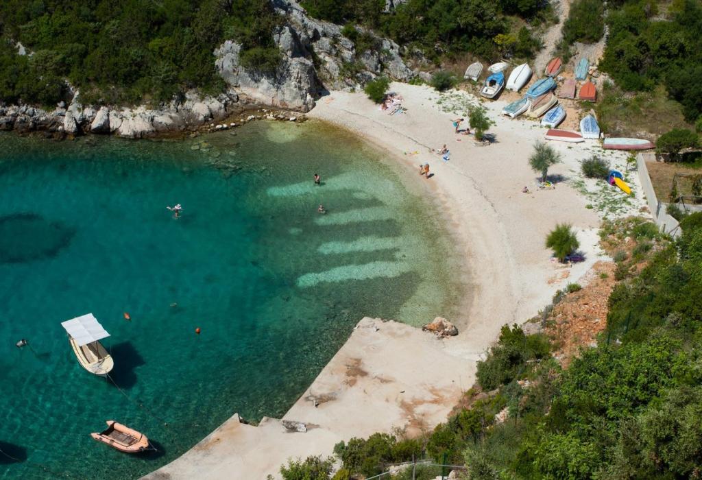 an aerial view of a beach with boats in the water at Apartments Paradise With Amazing Sea View in Vinišće