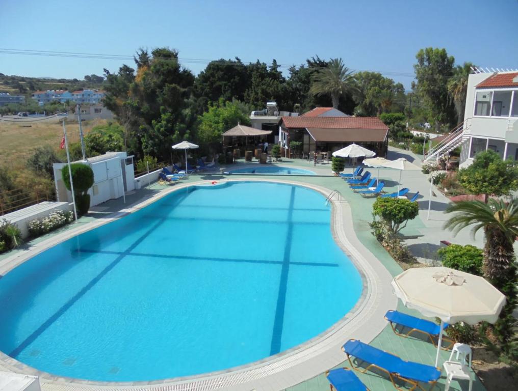an overhead view of a swimming pool at a resort at Asterias Bay Hotel By Anayia All Inclusive Resorts in Theologos