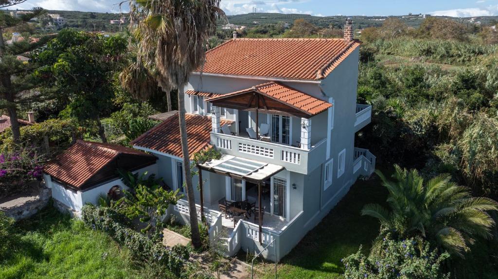 an aerial view of a house with a red roof at Esperado Gardens Maleme in Maleme
