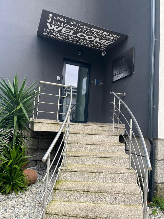 a set of stairs leading up to a door at In Barcelos View Lodge in Barcelos