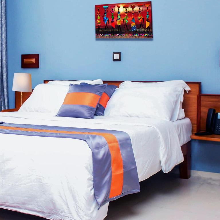 Postel nebo postele na pokoji v ubytování Premium HOTEL
