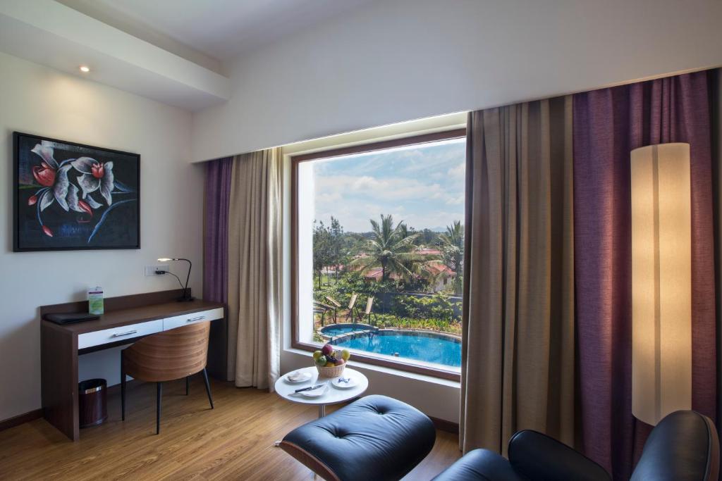 Bazén v ubytování Purple Palms Resort & Spa nebo v jeho okolí