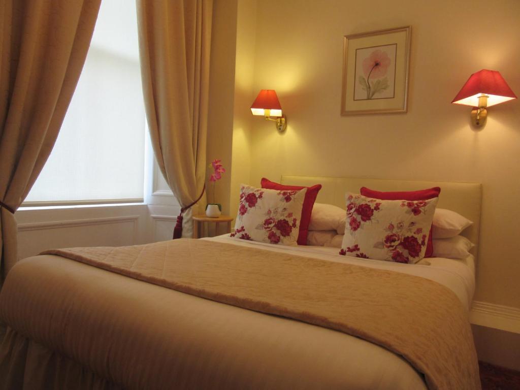 Postel nebo postele na pokoji v ubytování Sonas Guesthouse