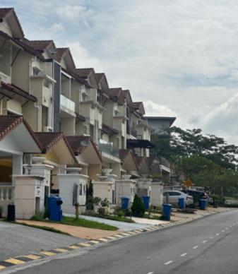 a row of houses on the side of a street at Setia Alam Urban Rooms in Shah Alam