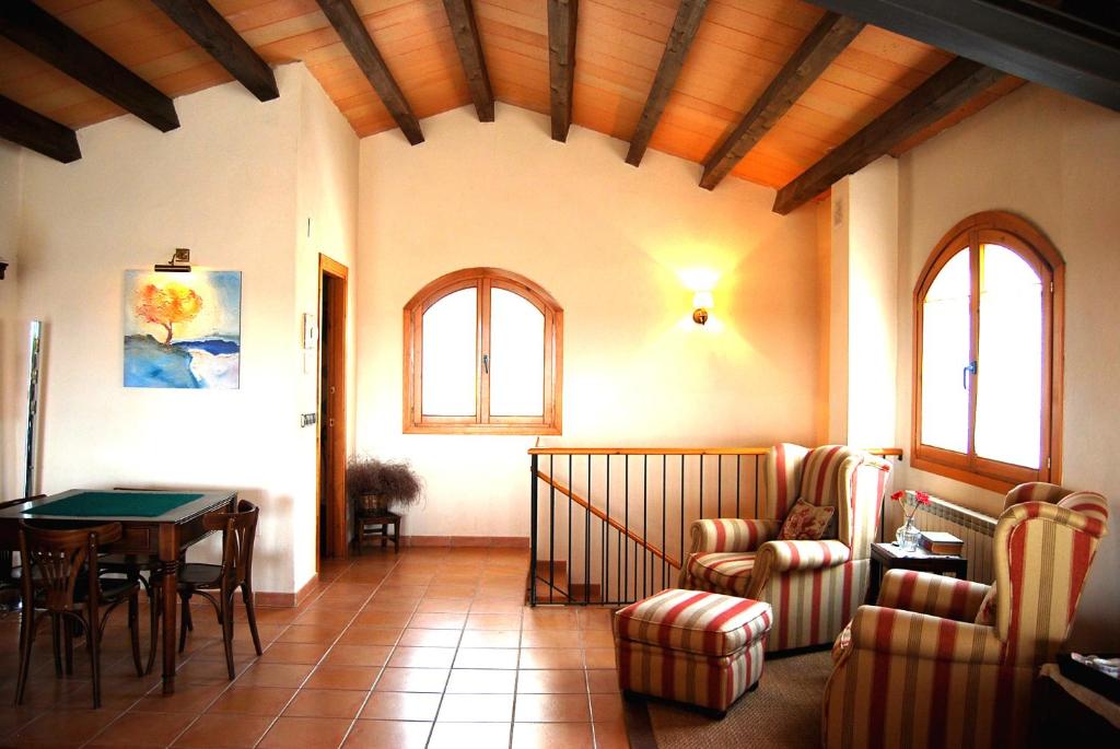 Posedenie v ubytovaní Apartament Ca l'Emilia