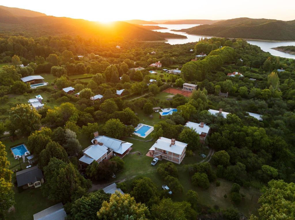 an aerial view of a estate with the sunset in the background at Cabañas Ocho Soles in Las Rabonas