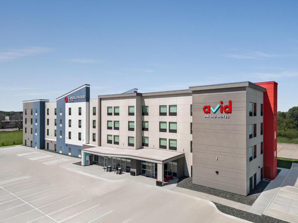 a rendering of a hotel with a rendering of the front of a building at avid hotel Bellefonte by IHG in Bellefonte