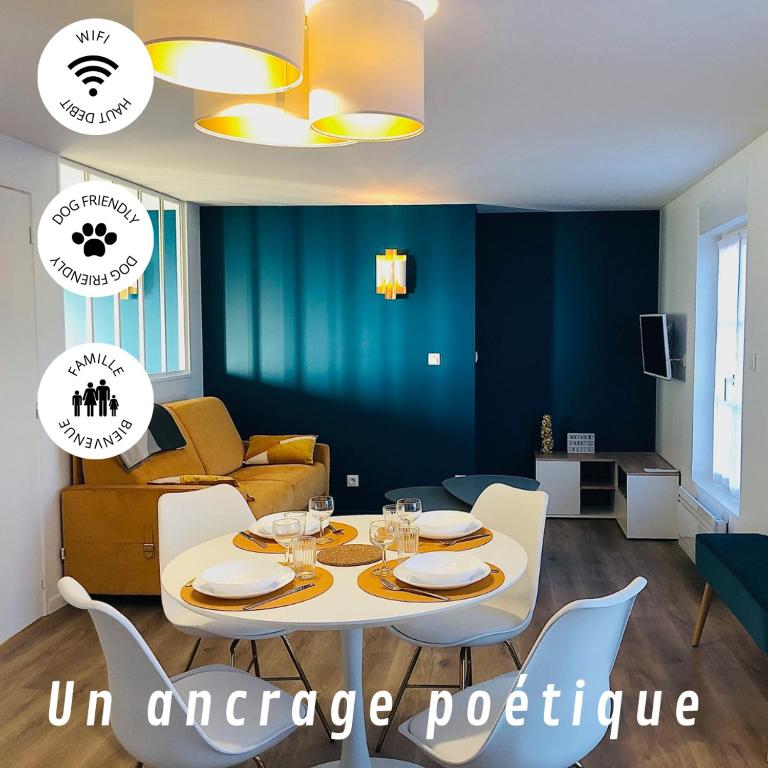 a living room with a white table and chairs at Maison Gabriel Appartement BULLE in Abbeville