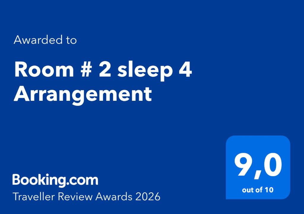 a blue sign that says room sleep arrangement at Room # 2 sleep 4 Arrangement in Edmonton