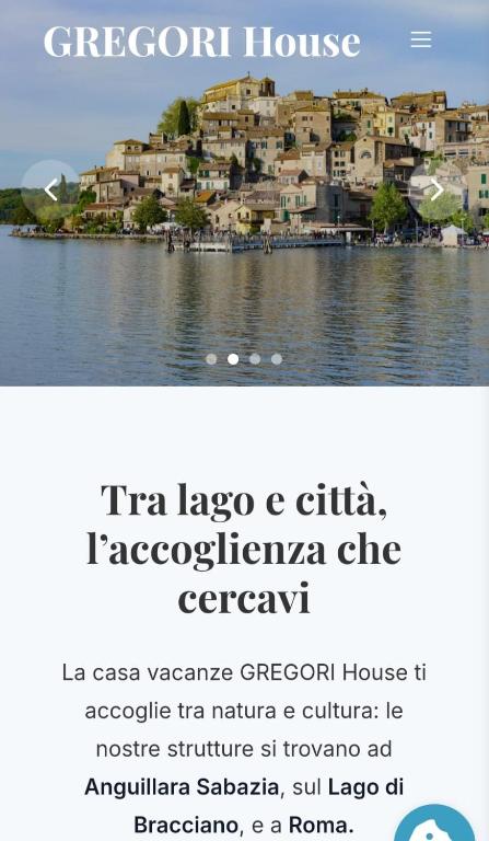 a poster for a house on the water with a town at GREGORIHOUSE Casa NICOLA in Anguillara Sabazia