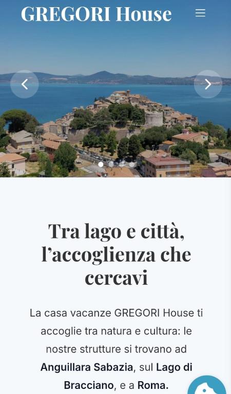 a poster for a city with a view of a town at GREGORIHOUSE Casa Giuditta in Anguillara Sabazia