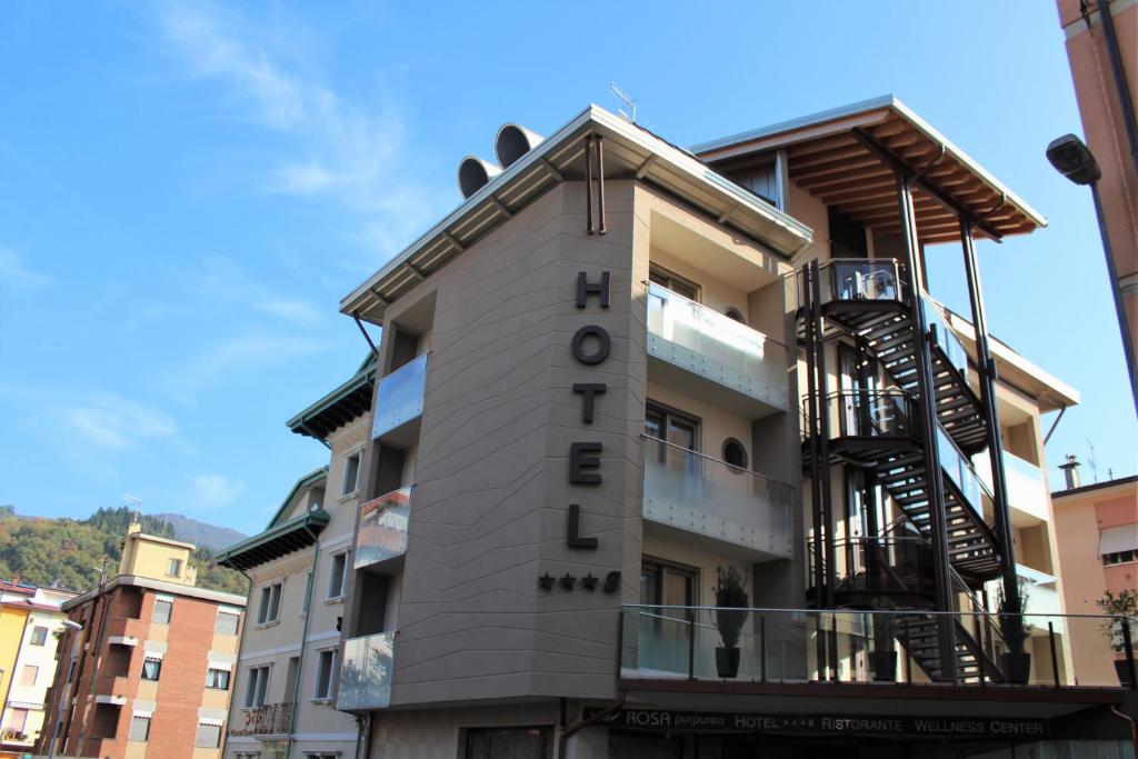 a building with a sign that says hotel at Rosa Purpurea Hotel in Valdagno