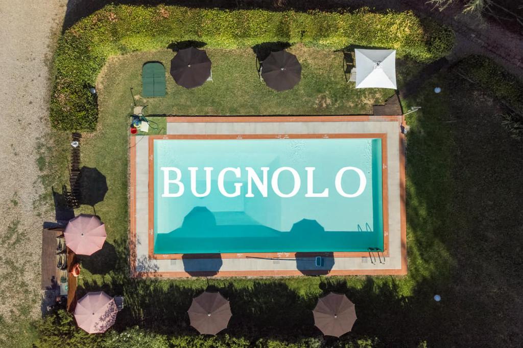 an overhead view of a bergonda sign in a yard at Bugnolo Miniloft in Poggibonsi