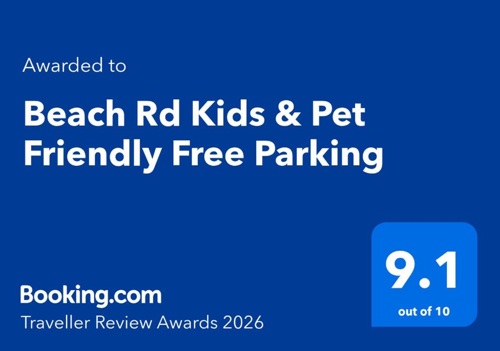 a blue sign with the words beach rd kids and pet friendly free parking at Beach Rd Kids & Pet Friendly Free Parking in Mordialloc