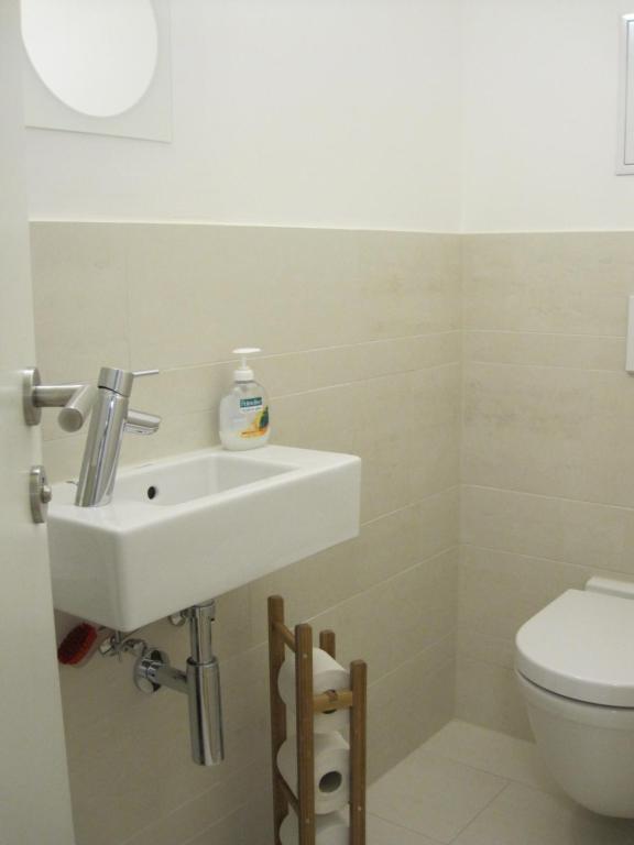 A bathroom at Apartment with parking on premise