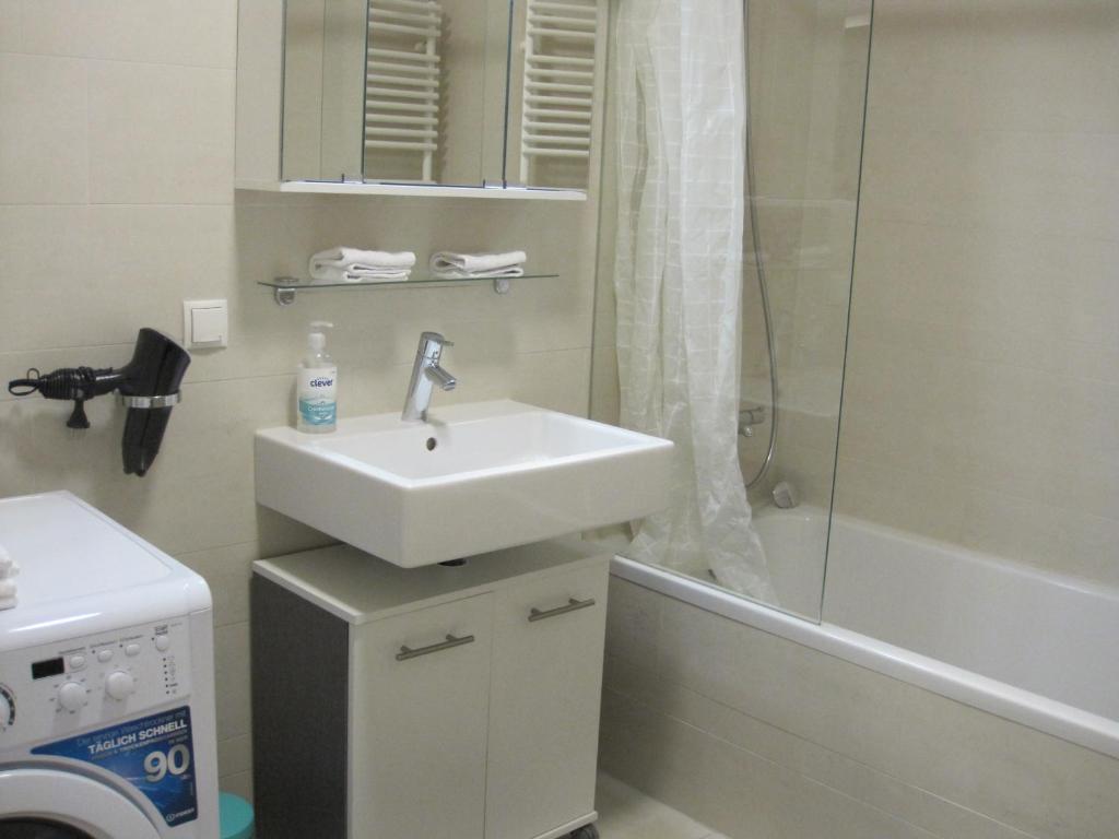A bathroom at Apartment with parking on premise