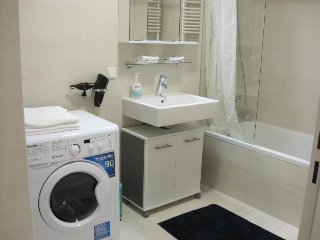 A bathroom at Apartment with parking on premise