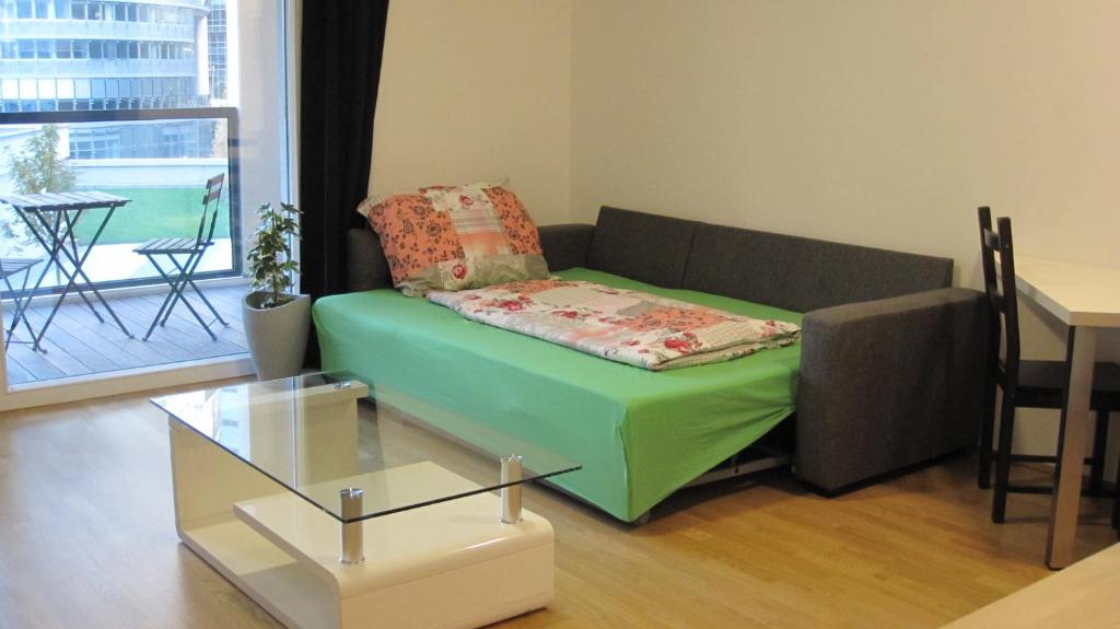 A bed or beds in a room at Apartment with parking on premise
