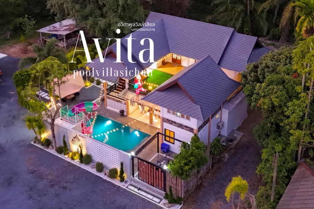 an aerial view of a house with a swimming pool at Avita Pool Villa in Sichon