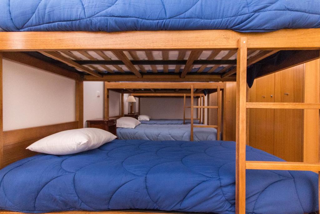 Postel nebo postele na pokoji v ubytování Hostel D'Avenida