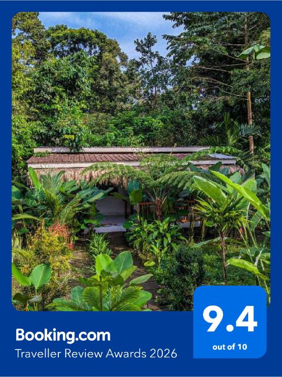 a picture of a garden with a bridge and trees at Stokel Cottage in Praya