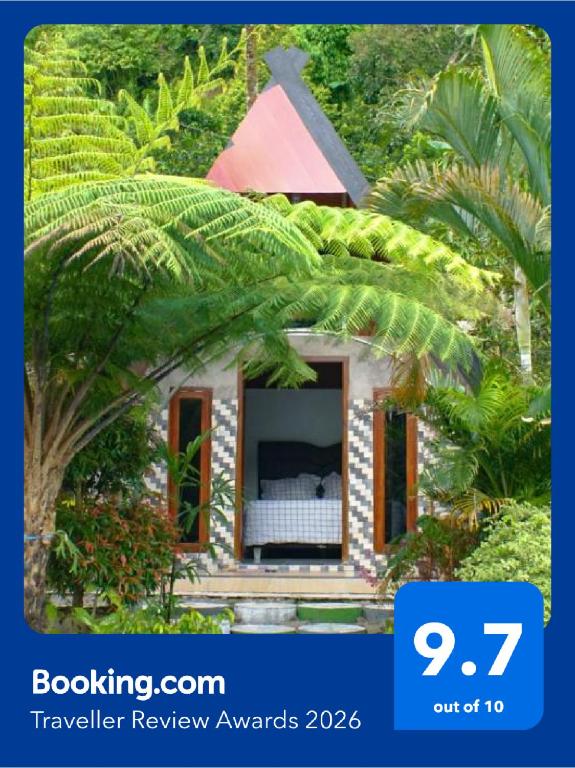 a sign that says a bedroom in a tiny house at Goa Walet Cottage in Praya