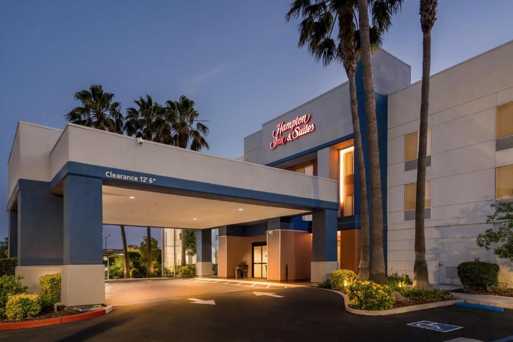 a rendering of the entrance to a hotel at Hampton Inn & Suites Lathrop in Lathrop