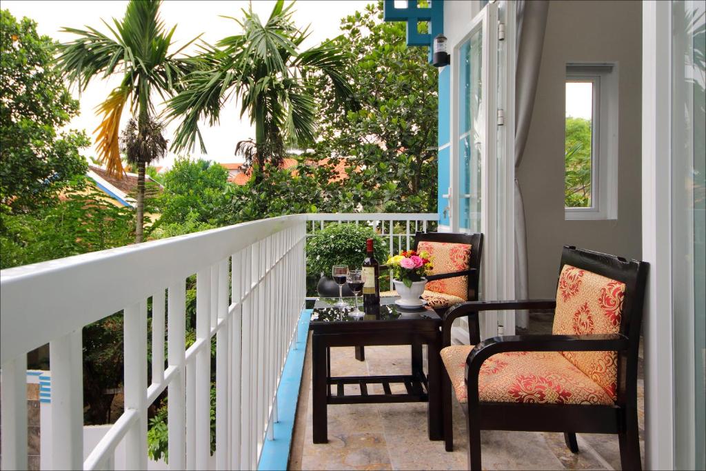 Balkón nebo terasa v ubytování Lucky Leaf Hoian Villa