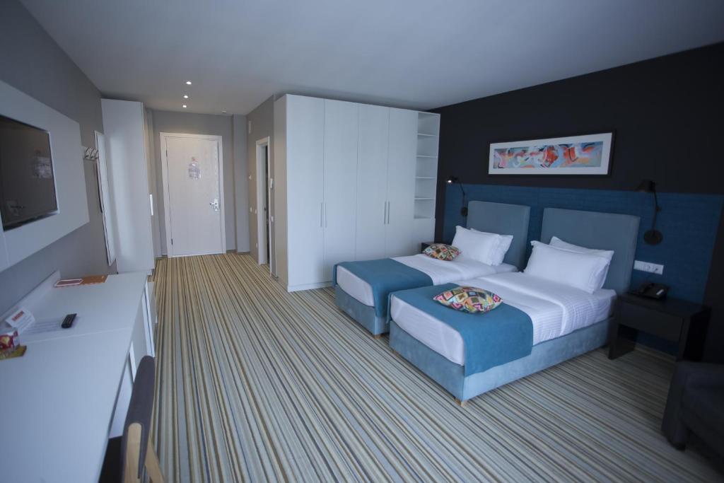 Aparthotel Tangerine - Deluxe Dreibettzimmer