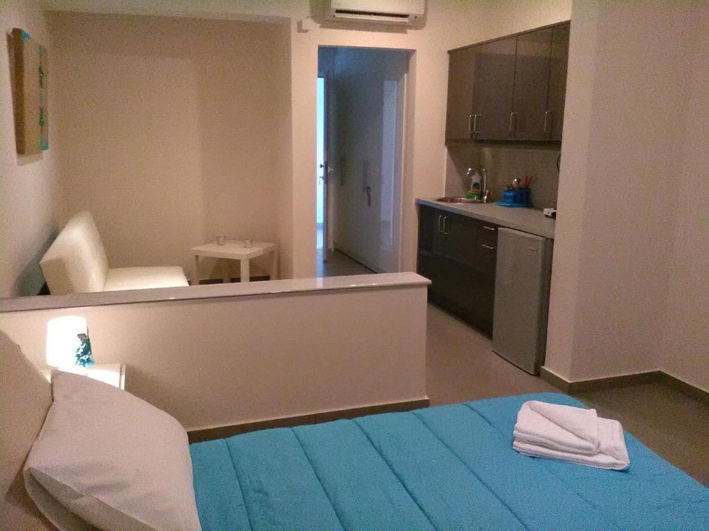 Posteľ alebo postele v izbe v ubytovaní Fevronia's Rooms