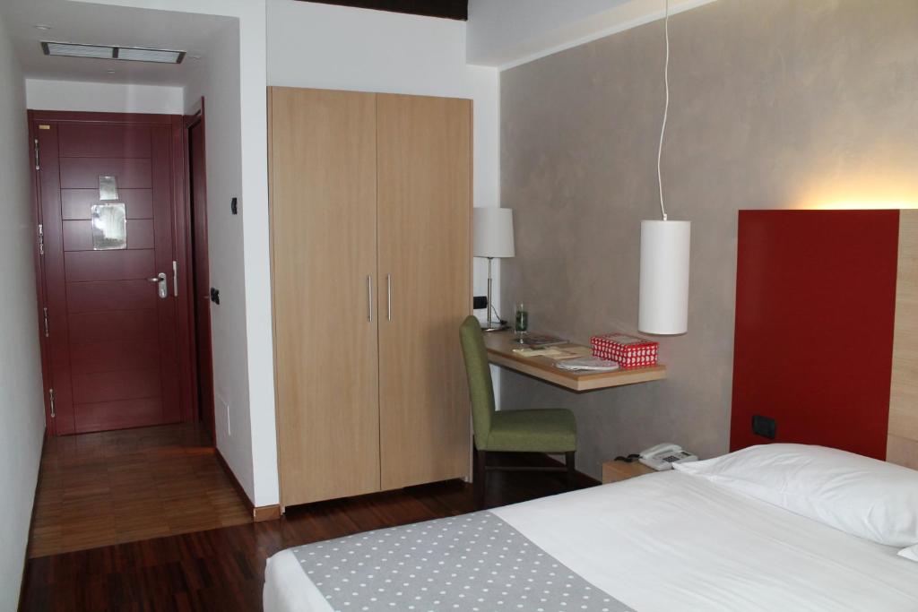 Postel nebo postele na pokoji v ubytování Cascina Scova Resort