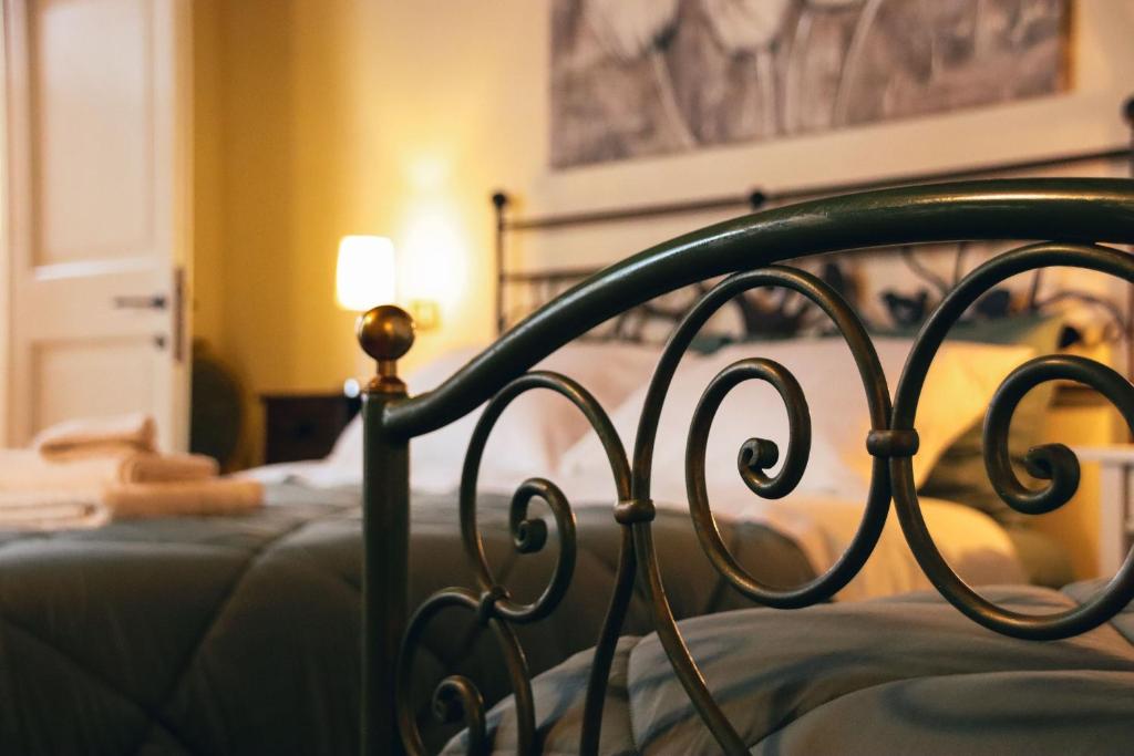 a close up of a bed in a bedroom at Ca 18 rooms in Lucignano