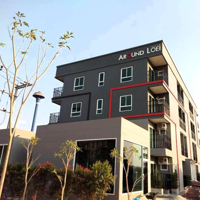 an apartment building with the air mind lease sign on it at Around Loei in Loei