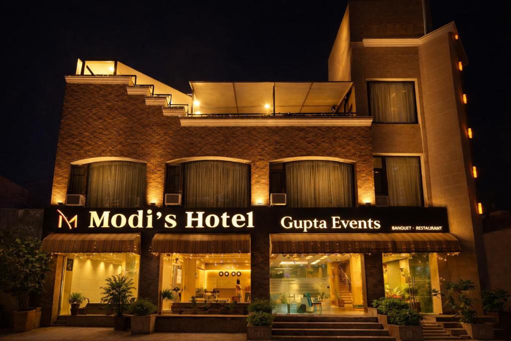 a hotel with a sign that reads mocha hotel at Modi Hotel & Resorts in Pinjaur