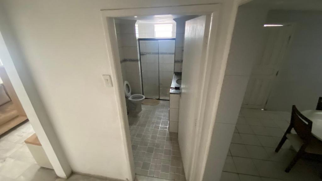 a bathroom with a shower and a toilet in a room at Casa Carnaval Olinda 2026 in Recife
