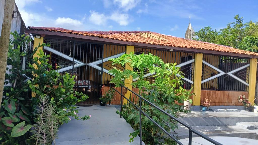 a building with a staircase in front of it at Varandas do mar II in Abade
