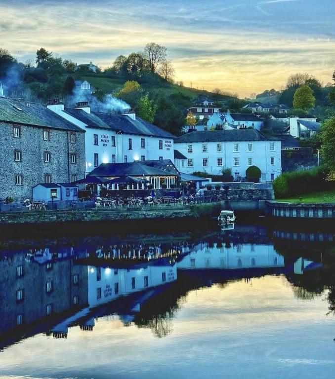 a small town next to a body of water at The Steam Packet Inn in Totnes